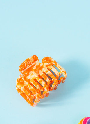 Evi - Extra tandjes Clip Marmer oranje - Modeaccessoires - Haarspelden