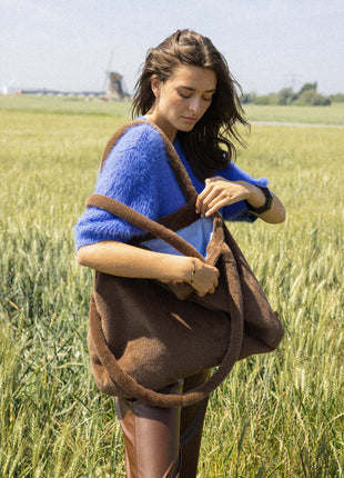 Fluffy trui met ronde hals – sporty blue Kleding Truien en cardigans